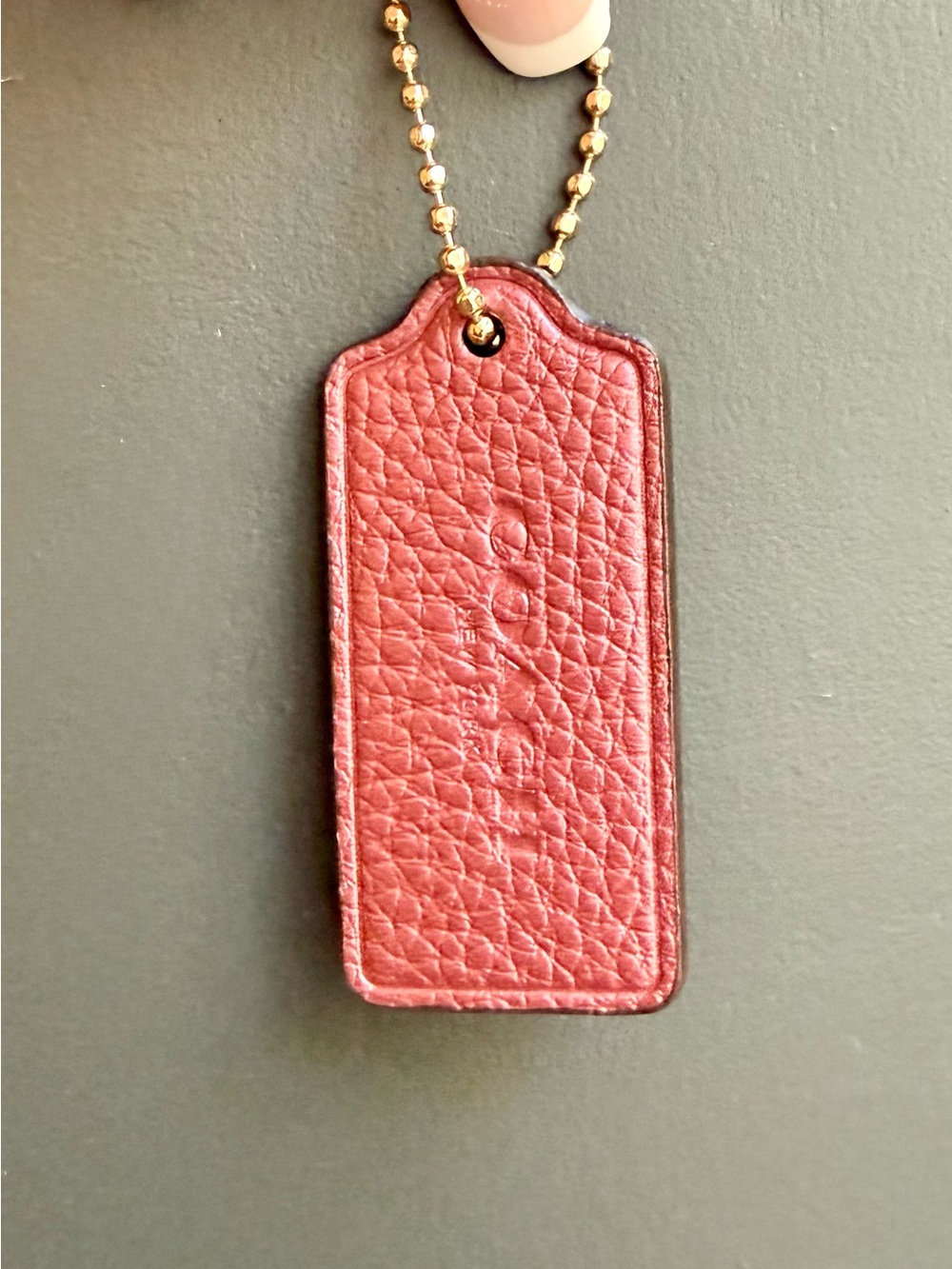 Coach Pebbled Leather Hang Tag in a Shimmering Pink Blush/Rose
